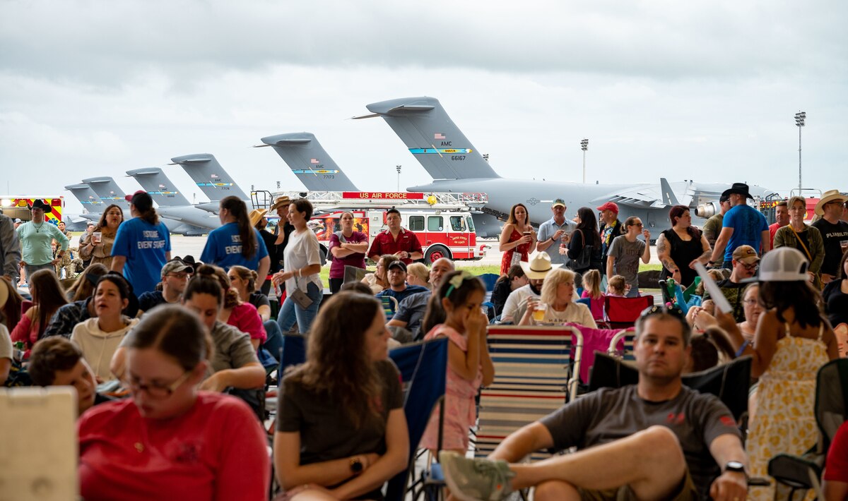 Team Dover members arrive for the Freedom Fest concert at Dover Air Force Base, Delaware, June 22, 2023. Freedom Fest, hosted by Air Force Entertainment Live Stage, was a free concert for Department of Defense card holders featuring opening act Ryan Daniel, support act Lonestar and headliner Rodney Atkins. (U.S. Air Force photo by Airman 1st Class Amanda Jett)