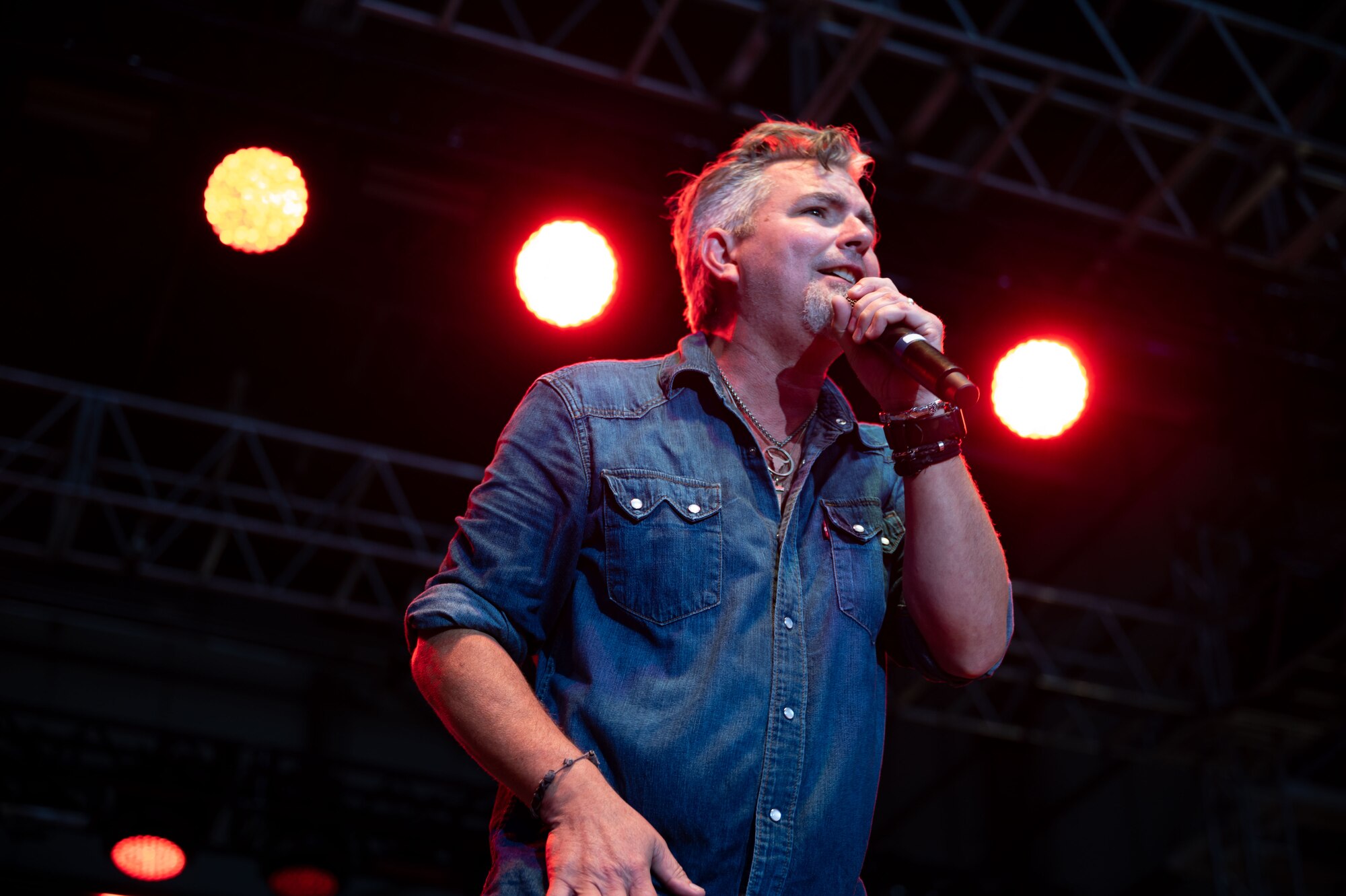 Drew Womack, lead singer of American country music band Lonestar performs during the Freedom Fest concert held on Dover Air Force Base, Delaware, June 22, 2023. Freedom Fest, hosted by Air Force Entertainment Live Stage, was free to Department of Defense card holders and featured opening act Ryan Daniel, support act Lonestar and headliner Rodney Atkins. (U.S. Air Force photo by Airman 1st Class Amanda Jett)