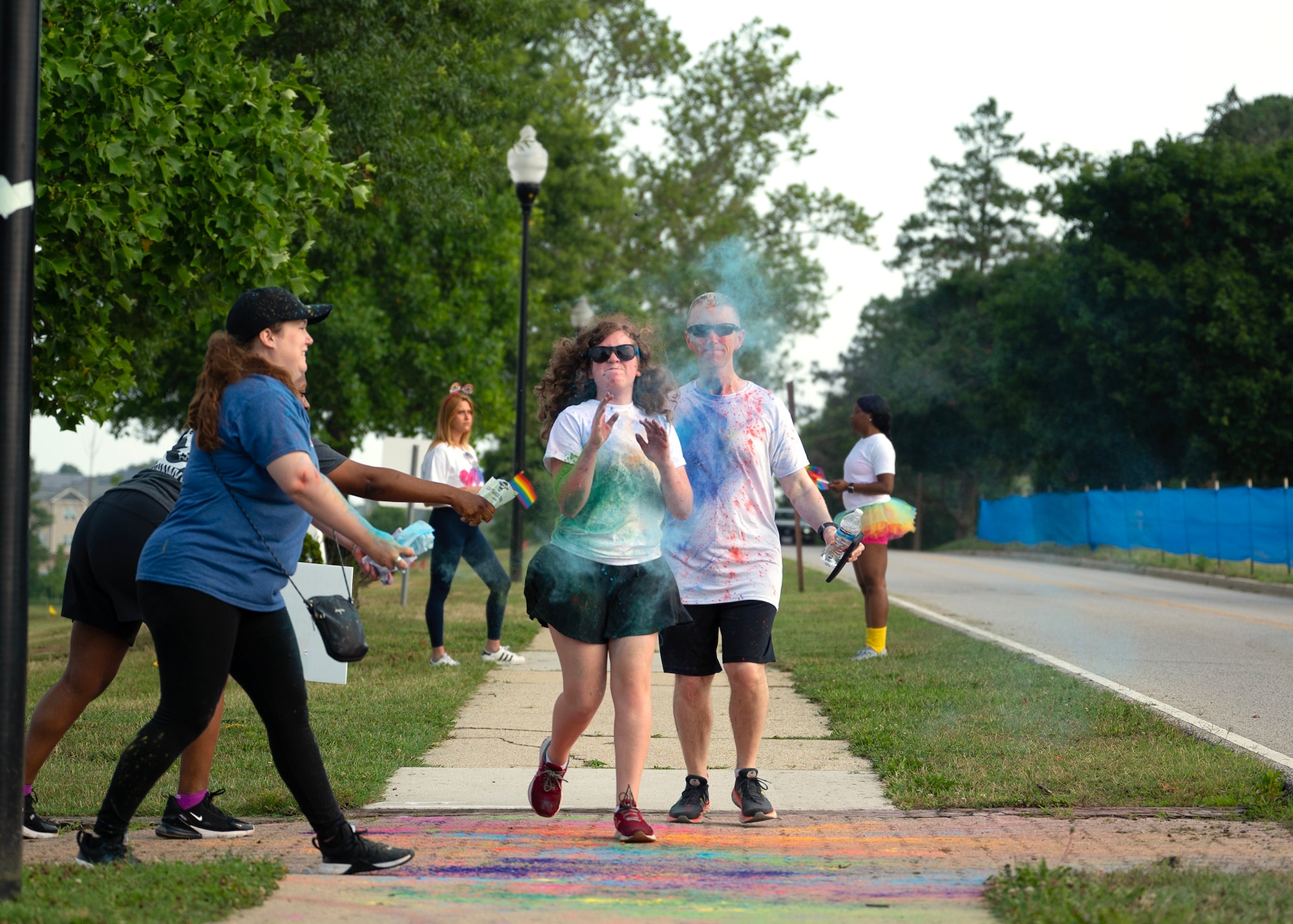 U.S. Army Col. Michael Sapp, right, Fort George G. Meade Garrison commander, participates in a Pride Month 5K Color Run, June 28, 2023, at Fort Meade, Maryland. The 70th Intelligence, Surveillance, and Reconnaissance Wing Diversity and Inclusion council partnered with Fort Meade Garrison to host the run highlighting Pride Month, which is celebrated every June to recognize and show support to LGBTQI+ members. (U.S. Air Force photo by Staff Sgt. Kevin Iinuma)