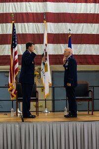 Lt. Gen. Michael Loh, Director of the Air National Guard, administers the oath of office to newly promoted Maj. Gen. Donald “DK” Carpenter June 1, 2023, at the Illinois National Guard’s 182nd Airlift Wing in Peoria, Illinois.