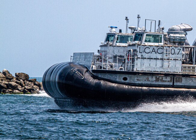 The next-generation landing craft, Ship to Shore Connector (SSC), Landing Craft, Air Cushion (LCAC) 107, flies to Naval Surface Warfare Center Panama City Division, June 28. The delivery of LCAC 107 comes after completion of Acceptance Trials conducted by the Navy’s Board of Inspection and Survey, which tested the readiness and capability of the craft to effectively meet its requirements. Textron Systems is currently in serial production on LCACs 108-119. (U.S. Navy photo by Eddie Green)