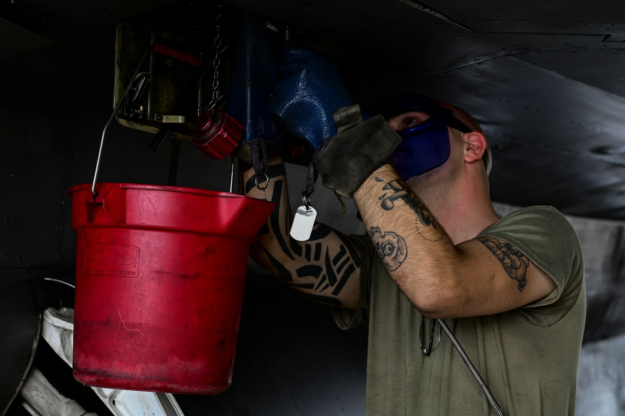 U.S. Air Force Airman 1st Class Kyle Trevarthen, 849th Aircraft Maintenance Squadron assistant dedicated crew chief, performs an exhaust fuel exchange on an F-16 Viper at Holloman Air Force Base, New Mexico, June 27, 2023.