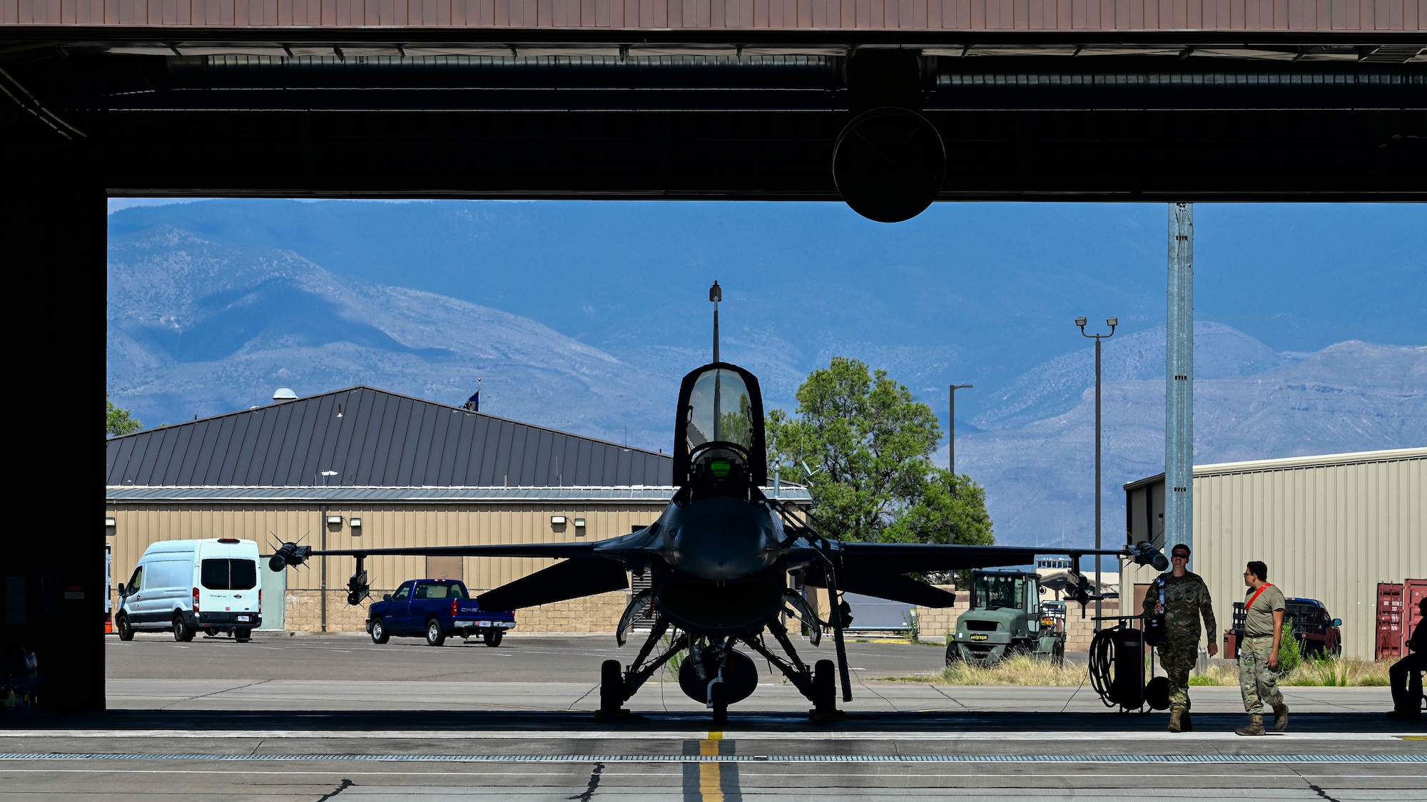 Airmen from the 849th Aircraft Maintenance Squadron perform maintenance on an F-16 Viper at Holloman Air Force Base, New Mexico, June 27, 2023.