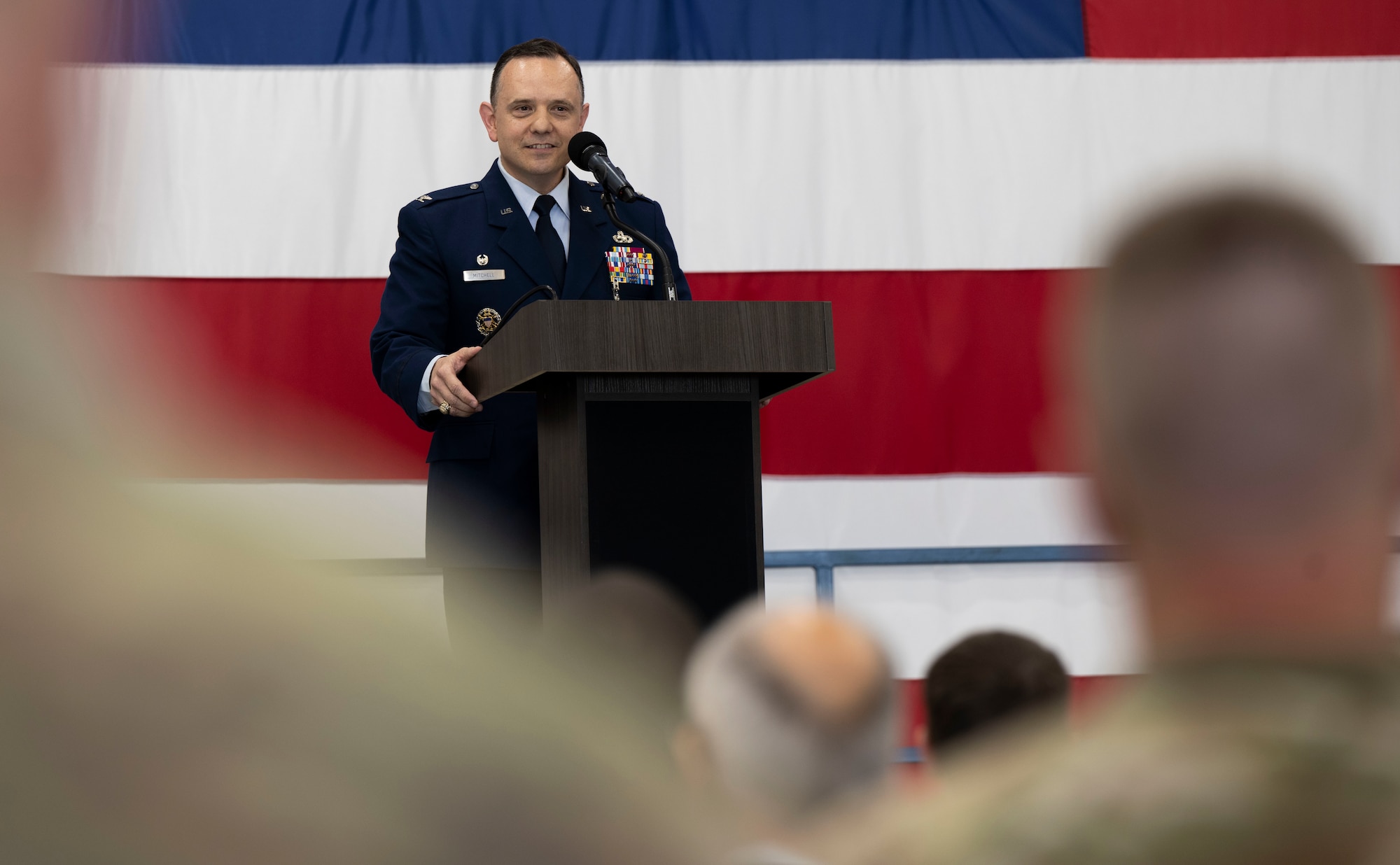 U.S. Air Force Col. Nathan Mitchell, outgoing 28th Maintenance Group commander, gives a speech during a change of command ceremony at Ellsworth Air Force Base, South Dakota, June 29, 2023.