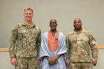 Army Col. Landis C. Maddox, right, Defense Logistics Agency Troop Support commander and Navy Capt. Andy E. Henwood, left, U.S. Navy Aviation Operations director with the Naval Supply Systems Command Weapon Systems Support Philadelphia pose with keynote speaker Ron Brown, Pennsylvania Juneteenth Coalition president, at DLA Troop Support’s Juneteenth event on June 26 in Philadelphia. The Equal Employment Opportunity offices of both Troop Support and NAVSUP WSS Philadelphia hosted the event to celebrate Juneteenth. (U.S. Photo by Ed Maldonado)