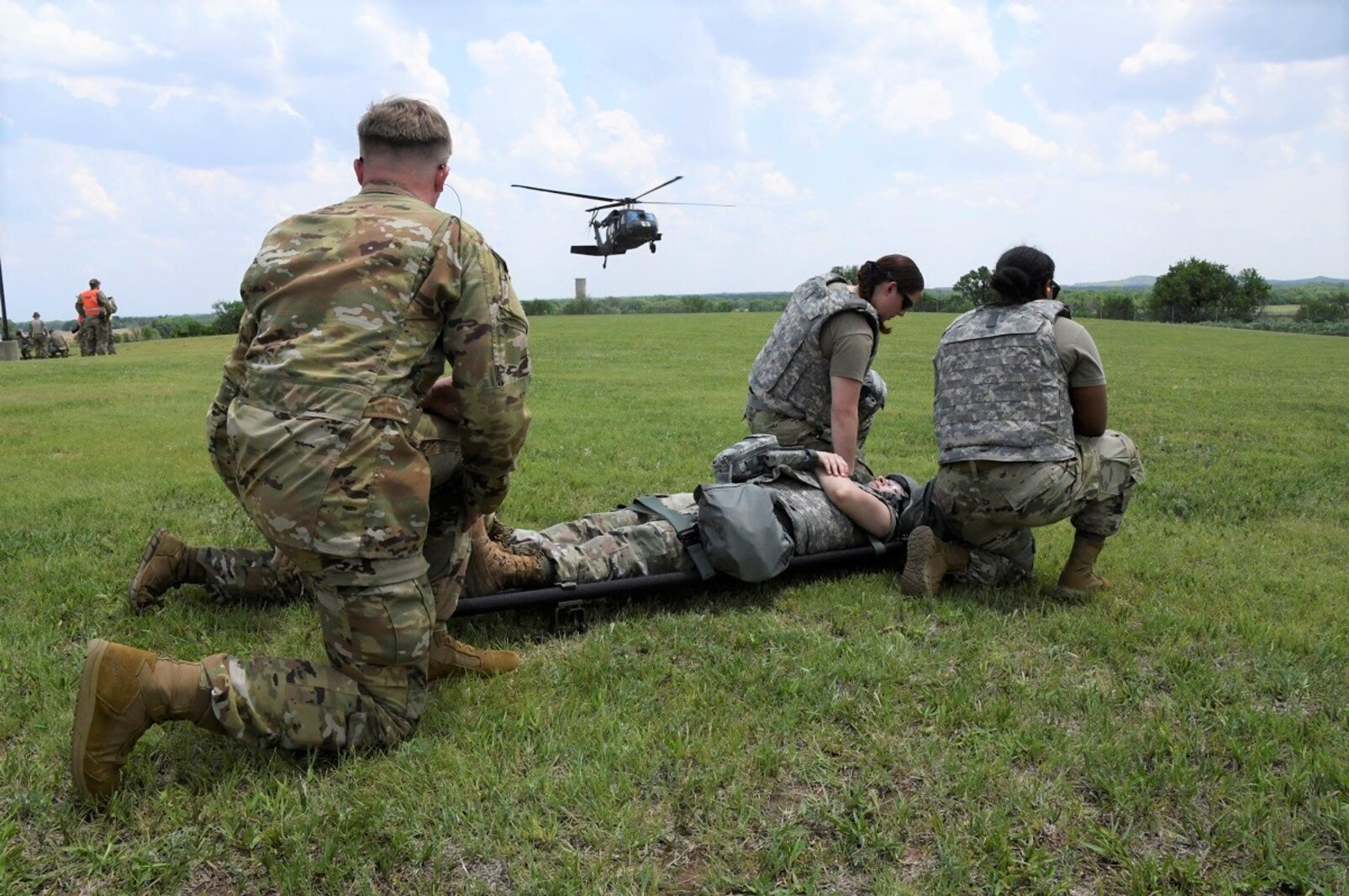 Airmen assigned to the 184th Medical Group await medical helicopters to transport injured personnel out of the area during Exercise Jayhawk Talon at Smoky Hill Weapons Range, Kansas, June 5, 2023.
