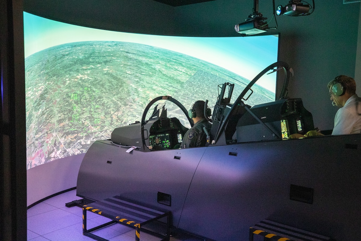 Maj. Bryce Turner, 416th Flight Test Squadron trains in a flight simulator before becoming the first Air Force pilot to fly the T-7A Red Hawk, prior to a test flight at the Boeing aircraft delivery center in St. Louis, Missouri, June 28.