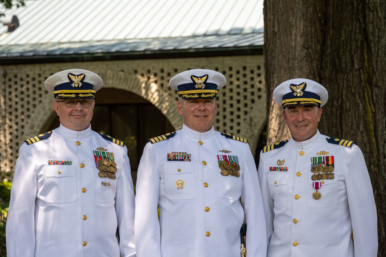 Cmdr. Elkins (left), Capt. Ryan and Cmdr. Lovenstein pose for a photo following Port Security 305’s change of command ceremony in Newport News, Virginia, June 27, 2023. Cmdr. John Elkins has relieved Cmdr. James Lovenstein as the commanding officer of PSU 305, Capt. Jason Ryan, chief of Pacific Area operations, presided over the ceremony. U.S. Coast Guard courtesy photo.