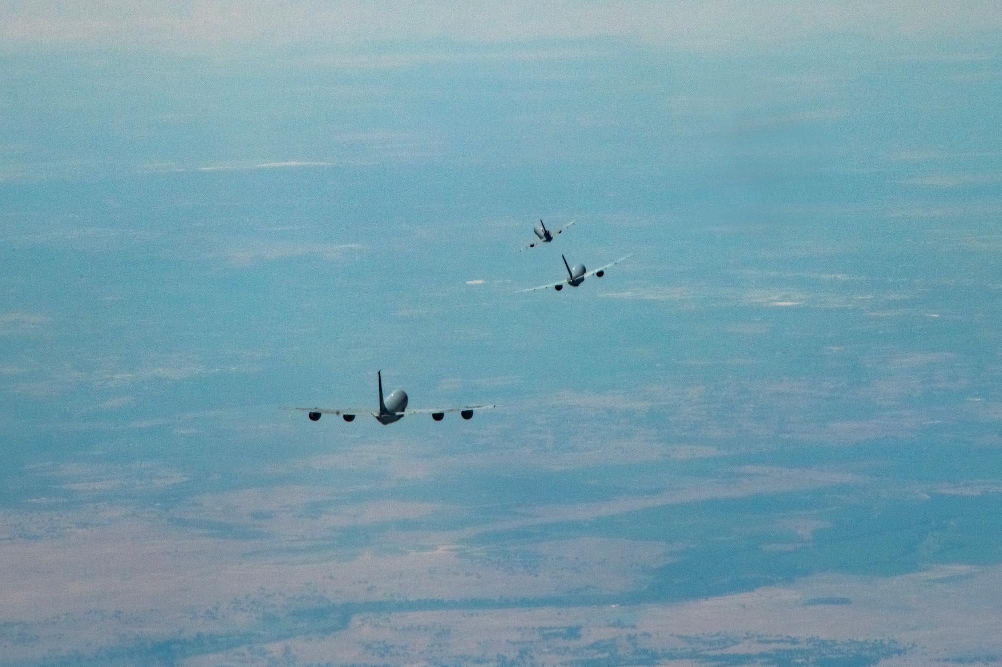 three aircraft flying in formation
