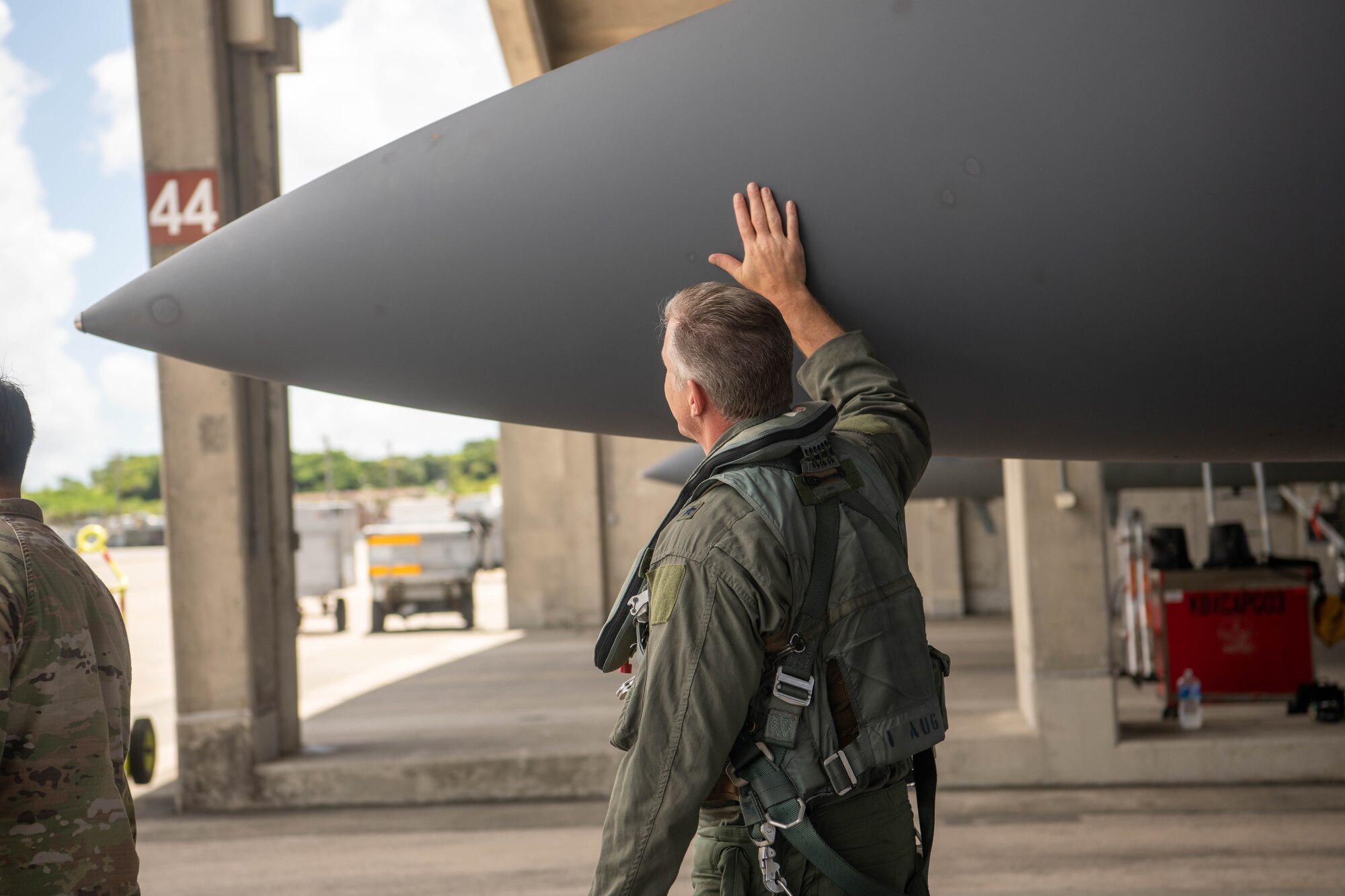 A pilot conducts a pre-flight walk-around.