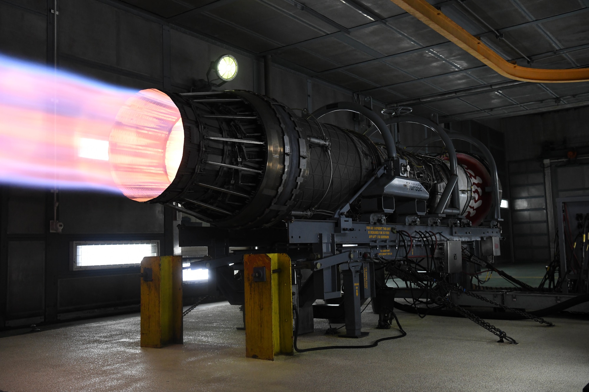 An F-15C jet engine is prepared to be tested in a full afterburner state, at Kadena Air Base, Japan,