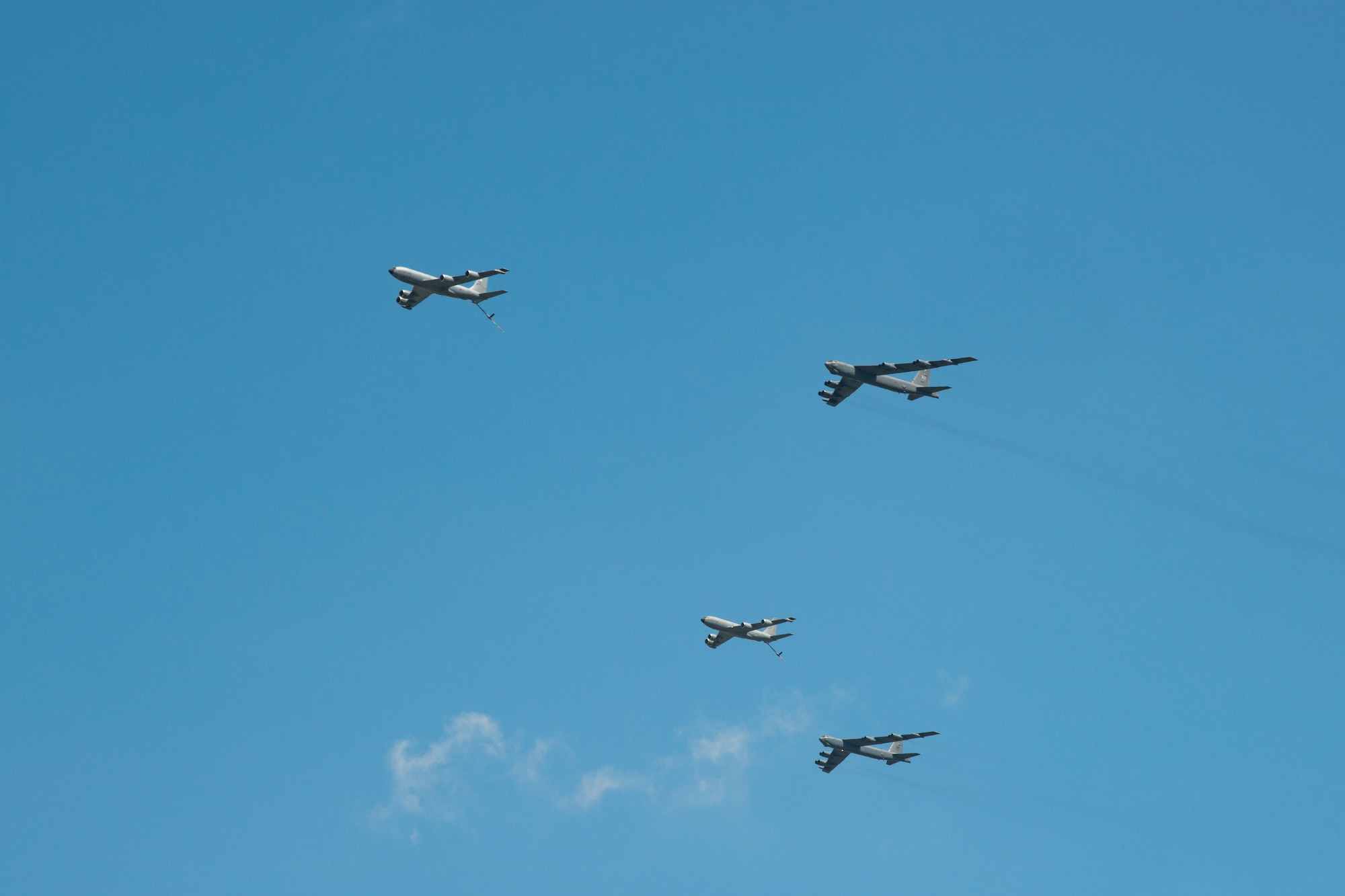 A formation of two B-52 H Stratofortresses, assigned to the 5th Bomb Wing, and Two KC-135 Stratotankers, assigned to the 92nd Air Refueling Wing, fly over Minot Air Force Base, North Dakota, June 27, 2023. The flyover was part of Operation Centennial Contact, celebrating 100 years of air refueling. (U.S. Air Force photo by Airman 1st Class Alyssa Bankston)