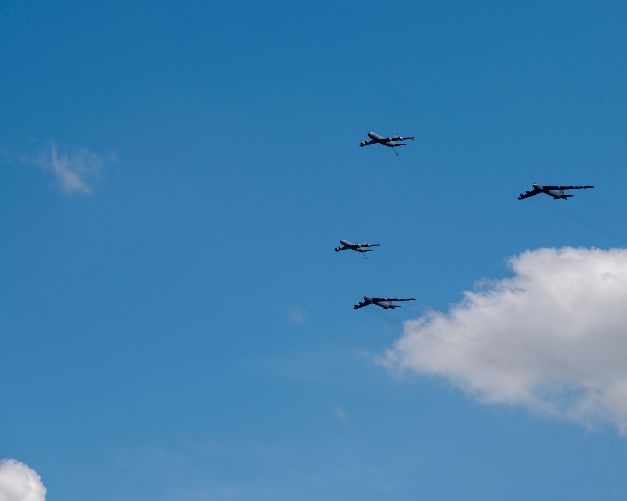 A formation of two B-52 H Stratofortresses, assigned to the 5th Bomb Wing, and Two KC-135 Stratotankers, assigned to the 92nd Air Refueling Wing, fly over Minot Air Force Base, North Dakota, June 27, 2023. The flyover was part of Operation Centennial Contact, celebrating 100 years of air refueling. (U.S. Air Force photo by Airman 1st Class Alyssa Bankston)
