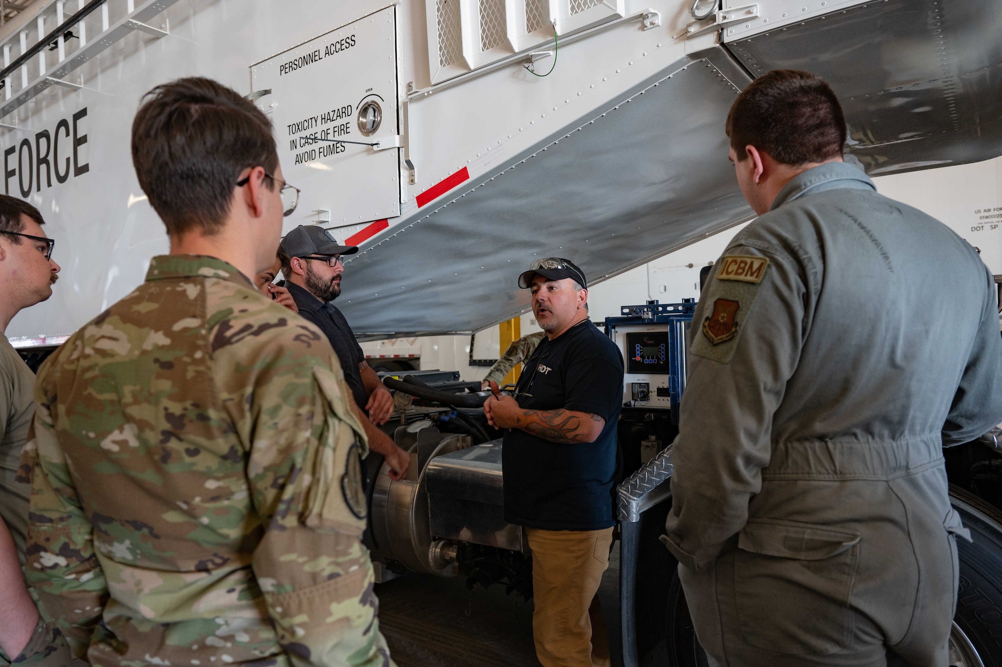 Christopher Mack, Hunter Defense Technologies senior manufacturing lead, trains 790th Maintenance Squadron Airmen on the Transporter Erector Replacement System at the 90th Maintenance Group building on F.E. Warren Air Force Base, Wyoming, June 28, 2023. The TERP is replacing the legacy transporter erector in preparation for the modernization of the wing through Sentinel. (U.S. Air Force photo by Senior Airman Sarah Post)
