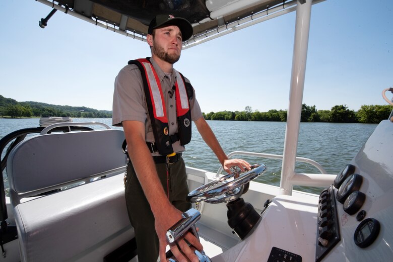 Park Ranger Bradford Grems patrols on Cheatham Lake in Ashland City, Tennessee, while looking out for public safety June 26, 2023. Grems frequently engages boaters to ensure they have required safety equipment onboard their vessels, and encourages everyone to wear their life jackets. He also spreads the message to boat captains that boating, and alcohol, never mix. (USACE Photo by Lee Roberts)