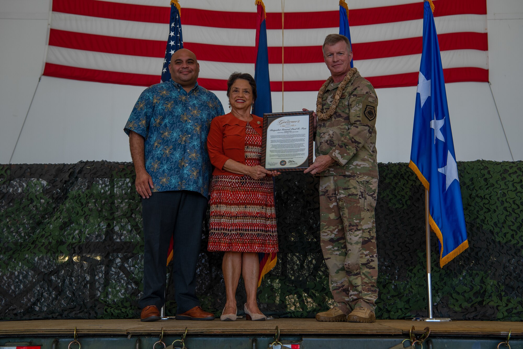 Governor of Guam Lou Leon Guerrero presents the Governor’s Award to U.S. Air Force Brig. Gen. Paul Fast, 36th Wing commander, June 30, 2023, at Andersen Air Force Base, Guam.