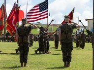 U.S. Marine Corps Maj. Gen. Jay Bargeron, right, passes the 3d Marine Division colors to Maj. Gen. Christian Wortman during a change of command ceremony on Camp Courtney, Okinawa, Japan, June 30, 2023. The ceremony signified the official transfer of command of 3d Marine Division from Maj. Gen. Bargeron to Maj. Gen. Wortman. (U.S. Marine Corps photo by Sgt. Jennifer Andrade)