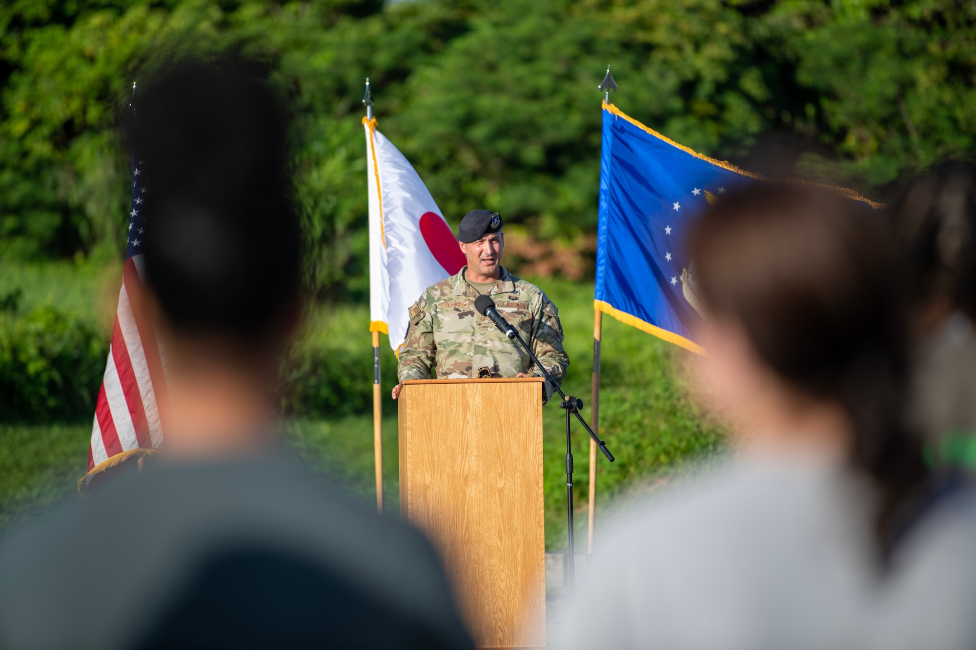 Command Chief Wolfgang delivers a speech to U.S. Air Force members participating in a unity walk at Kadena Air Base