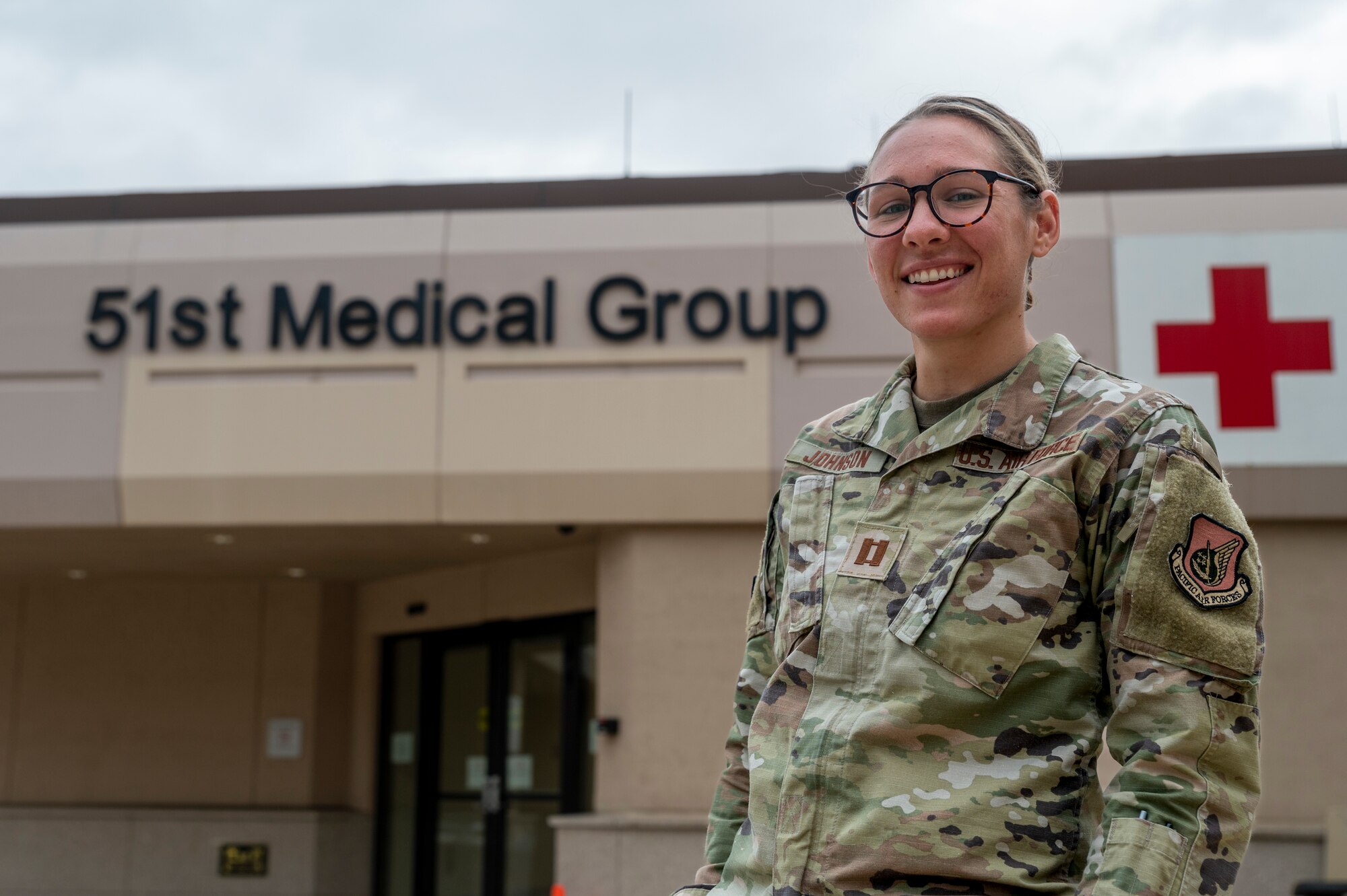 U.S. Air Force Capt. H. Marleen Johnson, 51st Medical Group (MDG) public health element chief, poses outside of the 51st MDG building at Osan Air Base, Republic of Korea, June 26, 2023.
