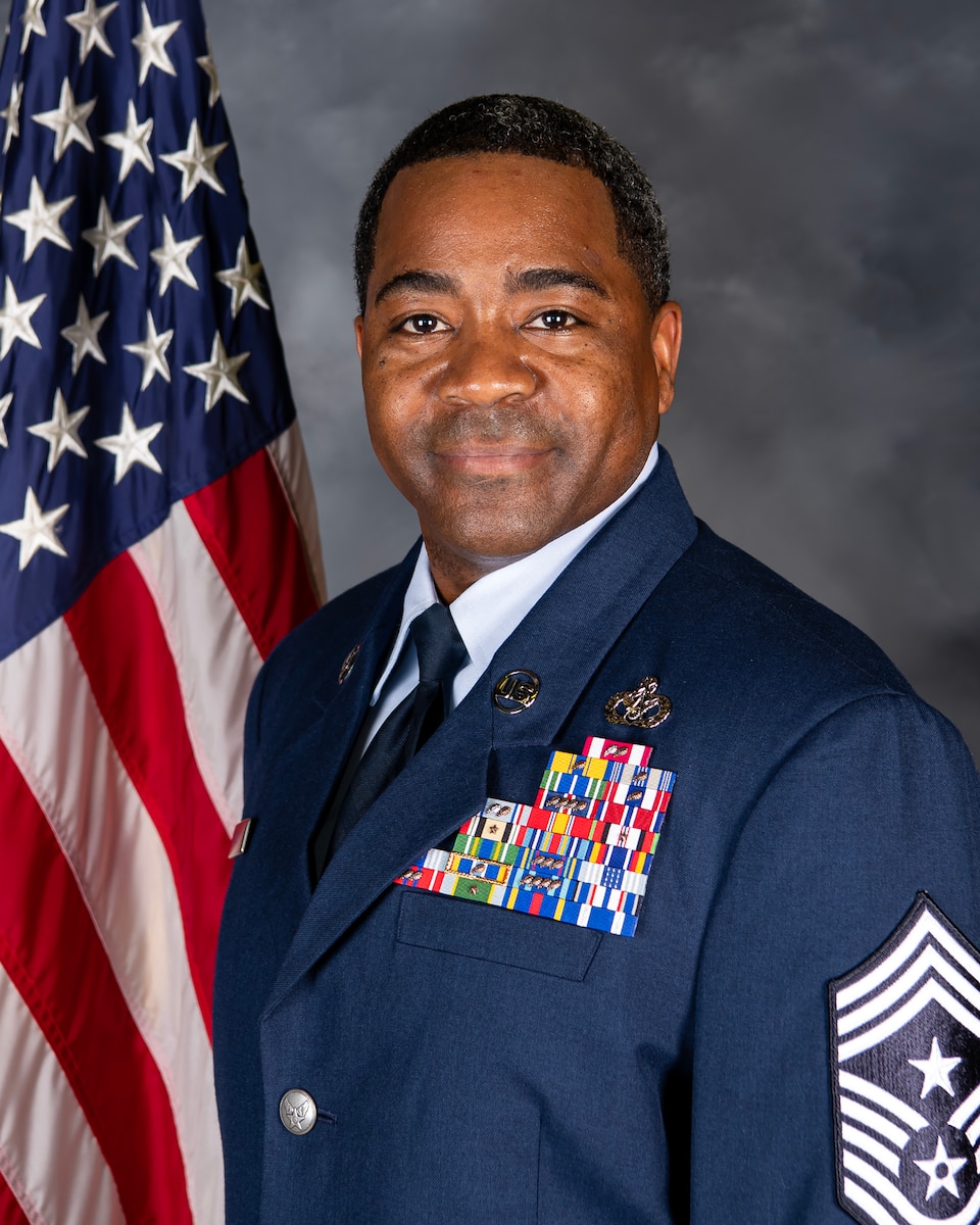 Chief Master Sgt. Terrance D. Boyd, 501st Combat Support Wing command Chief Master Sgt., Poses for a photo at RAF Croughton, England, June 28 2023. (U.S. Air Force Photo by Staff Sgt. Eugene Oliver)