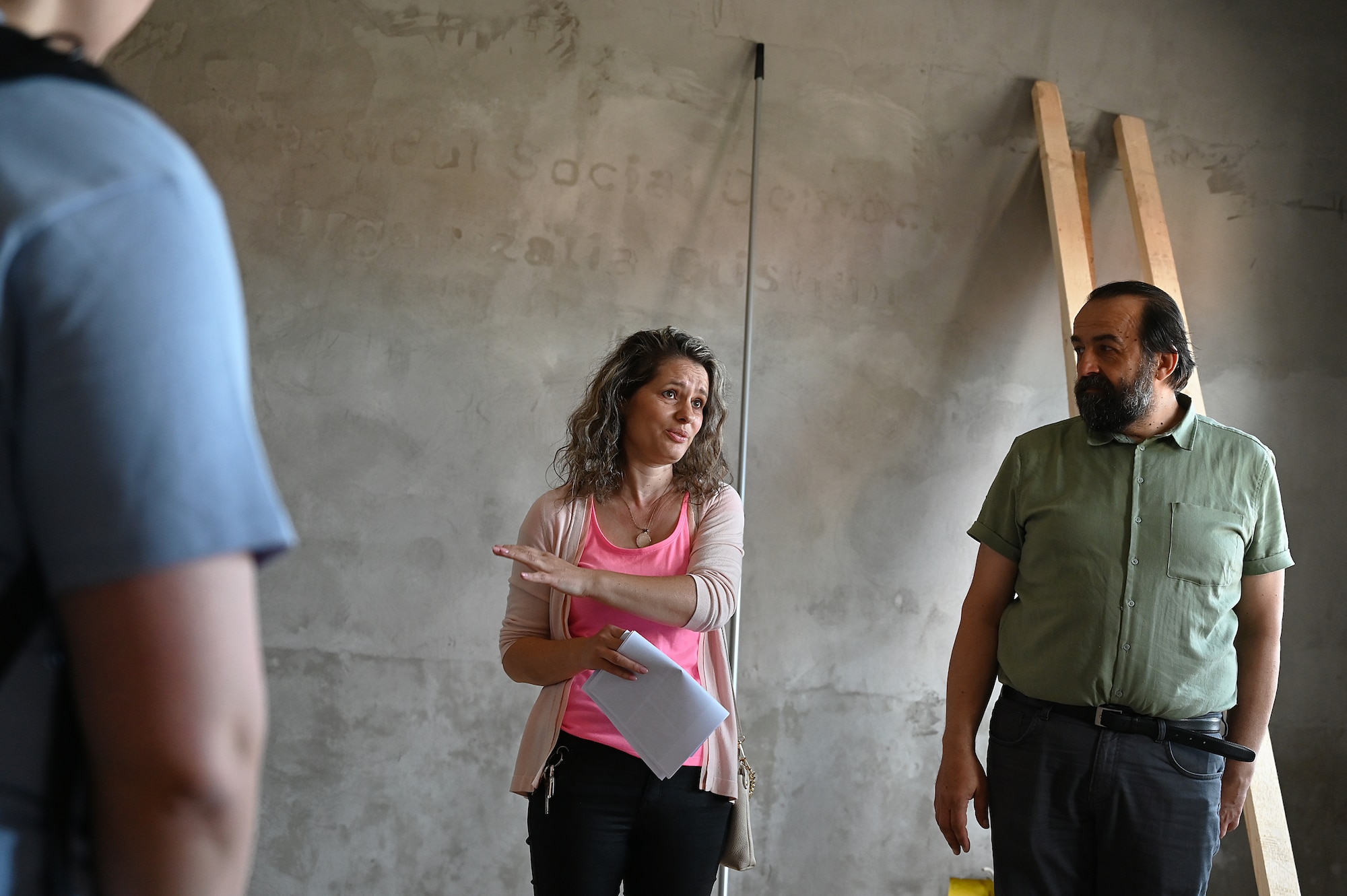 woman speaks to a group