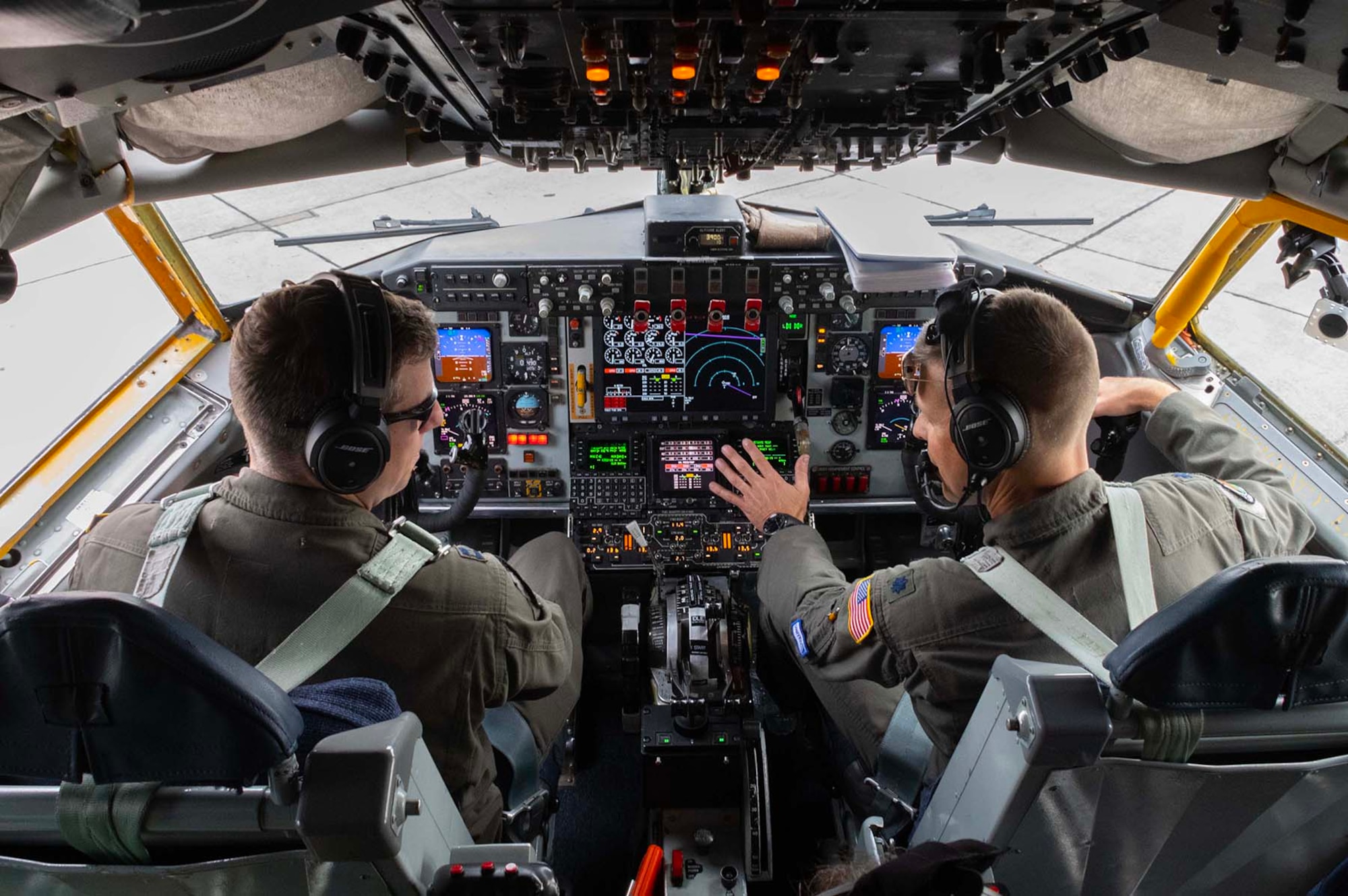 Photo of Airmen flying a jet