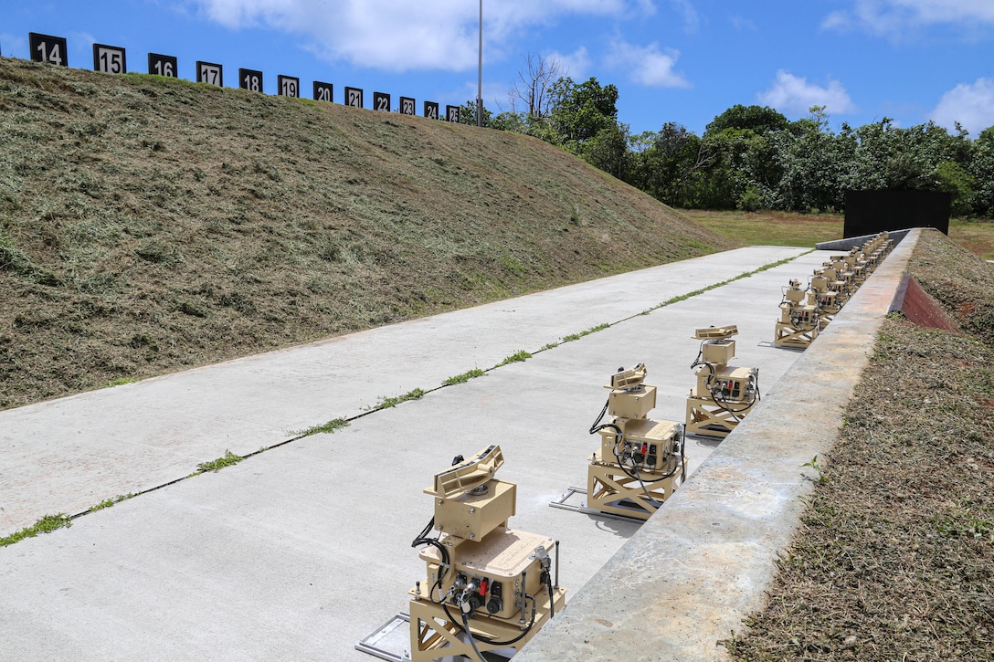 Theissen Training System target holding mechanisms are shown on the pistol range at the Marine Corps Base Camp Blaz Live-Fire Training Range Complex (LFTRC) on Guam, May 9, 2023. The systems will be used for the Marine Corps Annual Rifle Qualification and have the capability to provide users with a moving target. Once operable, the LFTRC will be available to be utilized by local government agencies, the Department of Defense and their partners.