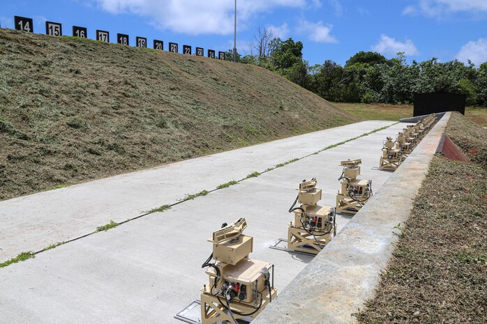 Theissen Training System target holding mechanisms are shown on the pistol range at the Marine Corps Base Camp Blaz Live-Fire Training Range Complex (LFTRC) on Guam, May 9, 2023. The systems will be used for the Marine Corps Annual Rifle Qualification and have the capability to provide users with a moving target. Once operable, the LFTRC will be available to be utilized by local government agencies, the Department of Defense and their partners.