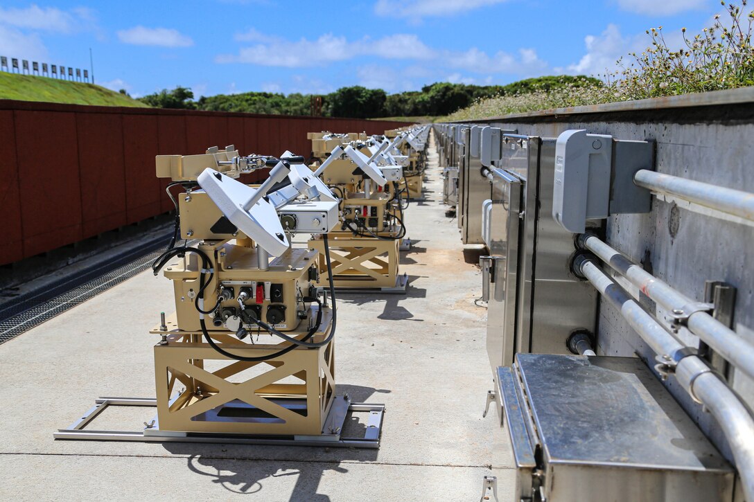 Theissen Training System target holding mechanisms are shown on the known distance range at the Marine Corps Base Camp Blaz Live-Fire Training Range Complex on Guam, May 9, 2023. The systems will be used for the Marine Corps Annual Rifle Qualification and have the capability to provide users with a moving target. Once operable, the LFTRC will be available to be utilized by local government agencies, the Department of Defense and their partners.