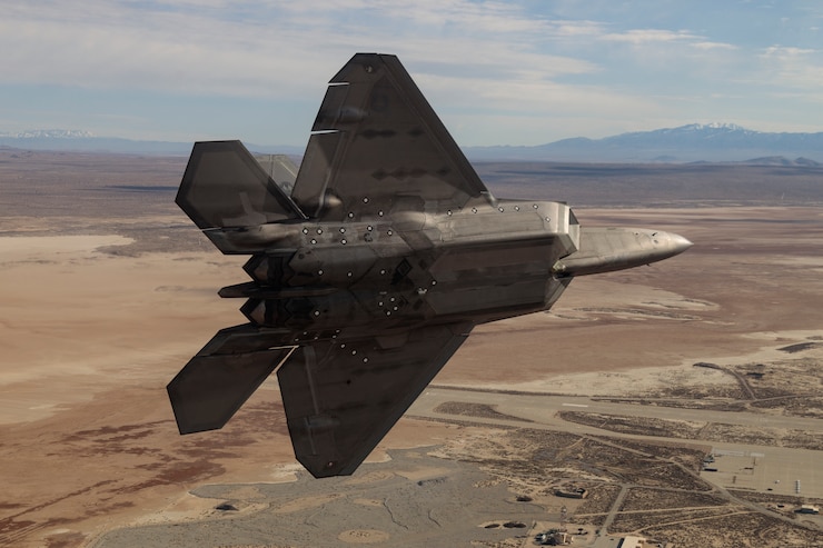 F-22 Raptors assigned to the 411th Flight Test Squadron, 412th Test Wing, out of Edwards Air Force Base, California, conduct a test sortie over the Pacific Ocean, Feb. 3. (Photo courtesy of Kyle Larson/Lockheed Martin)