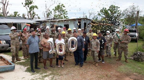 As part of recovery efforts following Typhoon Mawar’s landfall last month, Service members install the 100th temporary, emergency roof as part of the Roofing Installation Support Emergency Utilization Program (RISEUP), in Mangilao, Guam, June 27.