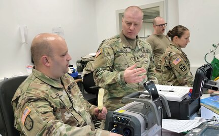 U.S. Army Reserve Soldiers from the 341st Medical Logistics Company maintenance platoon perform preventative maintenance on portable critical care ventilators at the U.S. Army Medical Materiel Center-Europe during Operation Patriot Press in May. Pictured, from left, are Spc. Ethan Lord, Sgt. Leonid Muzyr, Sgt. Alanna Yeutter and Sgt. Brian Lester. (Photo Credit: Staff Sgt. Christopher Norwood)