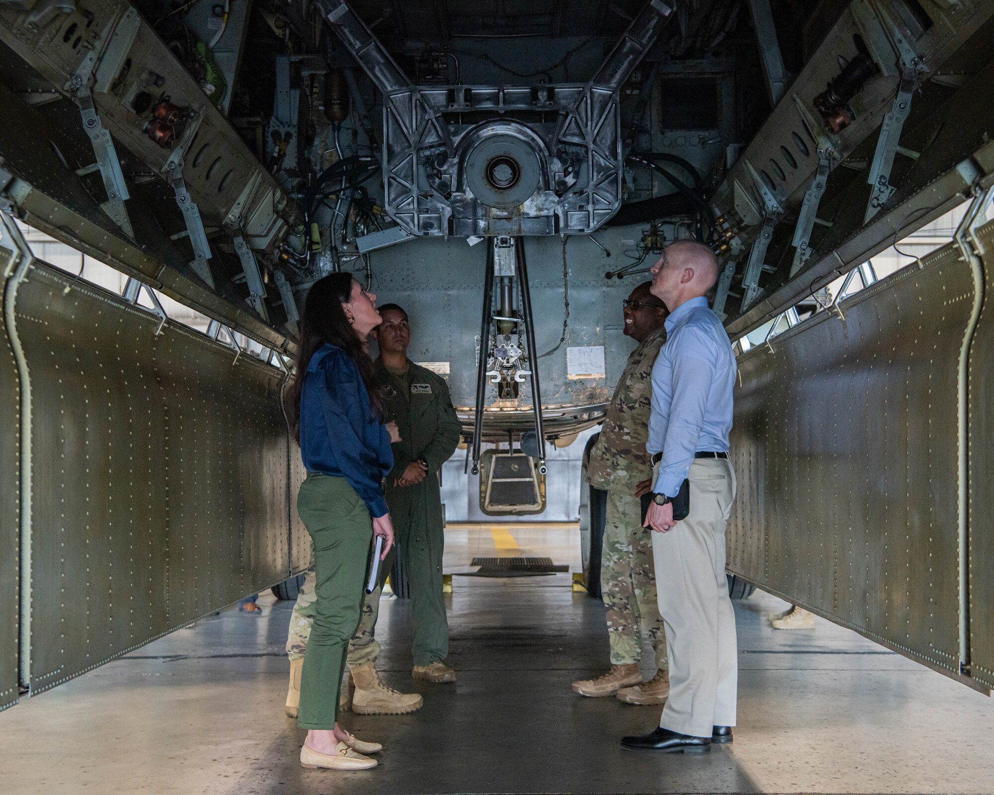 North Dakota state staff delegates tour the bomb bay of a B-52H Stratofortress at Minot Air Force Base, North Dakota, June 26, 2023. The B-52H Stratofortress is capable of carrying approximately 70,000 pounds of munitions with global strike precision. (U.S. Air Force photo by Airman 1st Class Kyle Wilson)