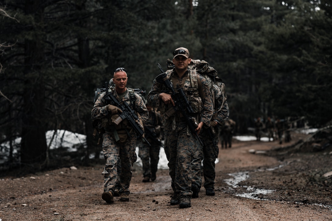 U.S. Marines with 4th Reconnaissance Battalion, 4th Marine Division, conduct a patrol during Mountain Exercise (MTX) 4-23 at Marine Corps Mountain Warfare Training Center, Bridgeport, California, June 11, 2023. MTX is designed to enhance maneuver capabilities, the conduct of expeditionary advanced base operations and logistical supply and support operations in an austere environment in accordance with Force Design 2030. (U.S. Marine Corps photo by Lance Cpl. Richard PerezGarcia)