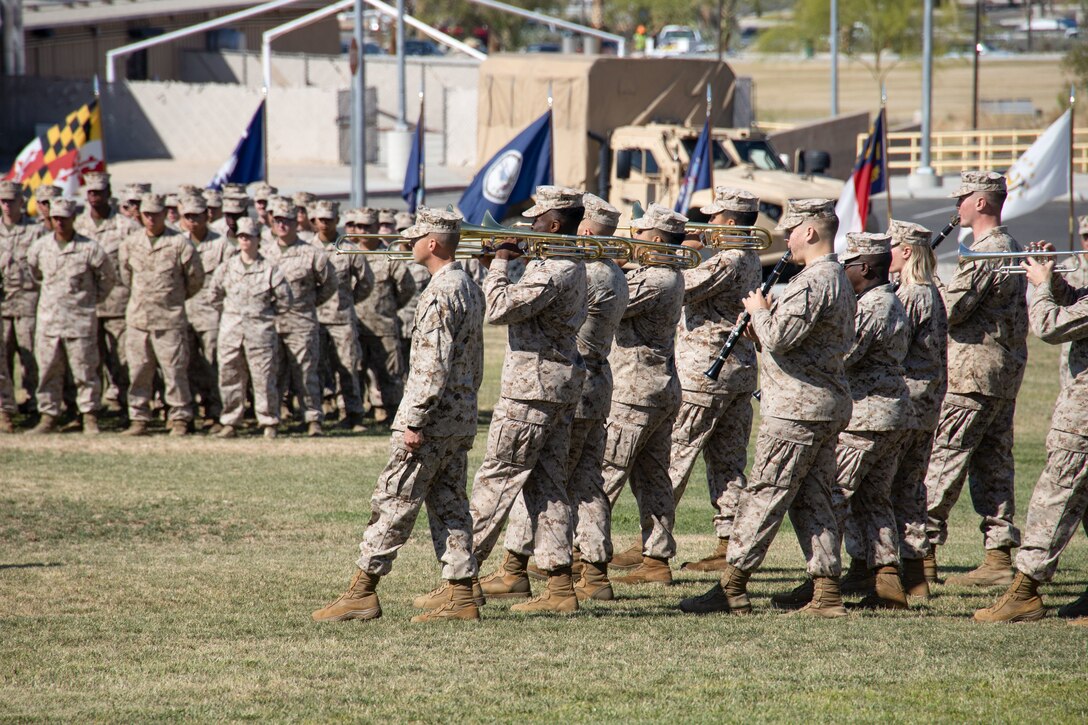 U.S. Marines with the 1st Marine Division Band, perform during the 3rd Battalion, 11th Marine Regiment,1st Marine Division change of command ceremony at Marine Corps Air-Ground Combat Center, Twentynine Palms, California, June 13, 2023. The change of command ceremony represents the official passing of authority from the outgoing commander to the incoming commander. (U.S. Marine Corps photo by Lance Cpl. Anna Higman)