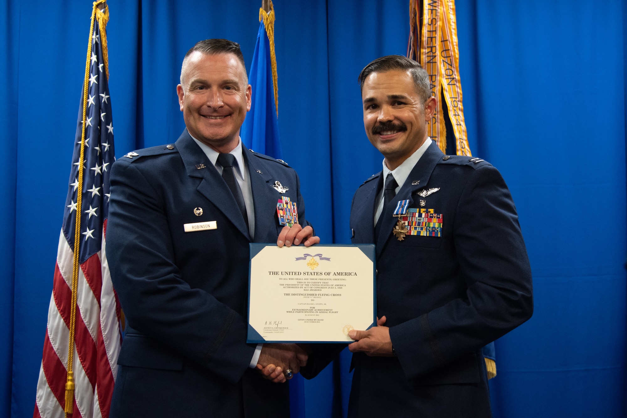 Command presents citation to Airman