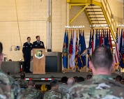 U.S. Air Force Col. Daniel Hoadly, 5th Bomb Wing commander, gives opening remarks at the 5th Maintenance Group (MXG) change of command at Minot Air Force Base, North Dakota, June 29, 2023. Hoadly welcomed the incoming 5th MXG commander, Col. Rofelio Grinston, and praised Col. Jeffrey Anderson for his performance as the outgoing 5th MXG commander. (U.S. Air Force photo by Senior Airman Evan Lichtenhan)