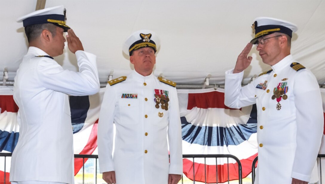 Capt. Michael Chien (left), relieves Capt. Daniel Keane (right)