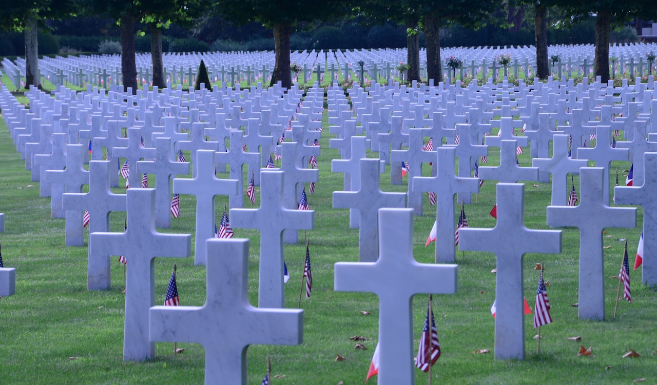 A photo shows headstones at a World War I cemetery.