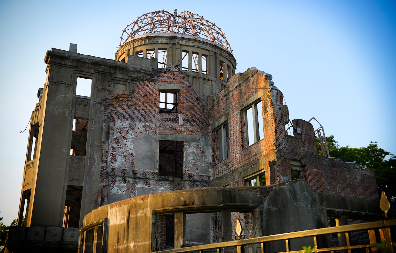 A photo shows the ruins of a building.