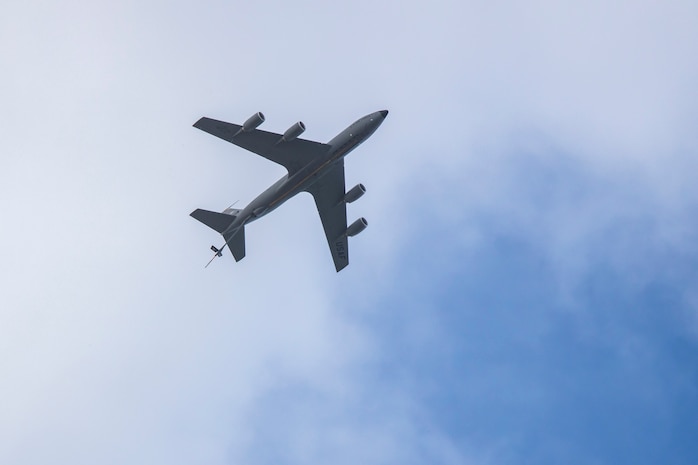 A U.S. Air Force KC-135 Stratotanker assigned to 203rd Air Refueling Squadron, 154th Wing, Hawaii Air National Guard, conducts a flyover during Operation Centennial Contact at Marine Corps Air Station Kaneohe Bay, Marine Corps Base Hawaii, June 27, 2023. The flyover commemorated the 100th anniversary of the first successful aerial refueling. More than 150 aircraft including KC-135 Stratotankers, KC-10 Extenders and KC-46 Pegasuses, conducted commemorative flyovers in all 50 states. (U.S. Marine Corps photo by Sgt. Julian Elliott-Drouin)