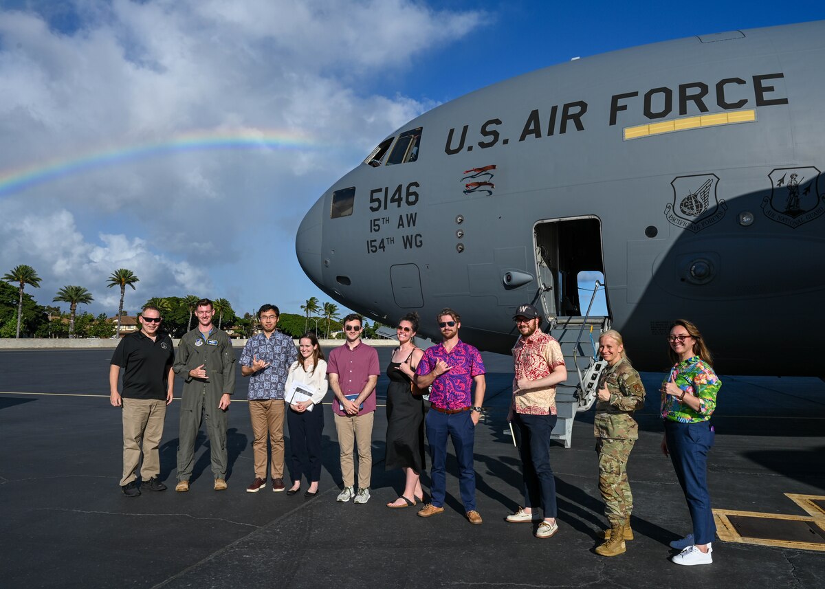 15th Wing leadership poses with a group of Congressional Staff Delegates during a tour of the 15th Wing at Joint Base Pearl Harbor-Hickam, Hawaii, June 28, 2023. The tour provided the STAFFDELs with a comprehensive understanding of the installation’s mission and capabilities it provides in order to enable, employ and project combat power within the Indo-Pacific. (U.S. Air Force photo by Senior Airman Zoie Cox)
