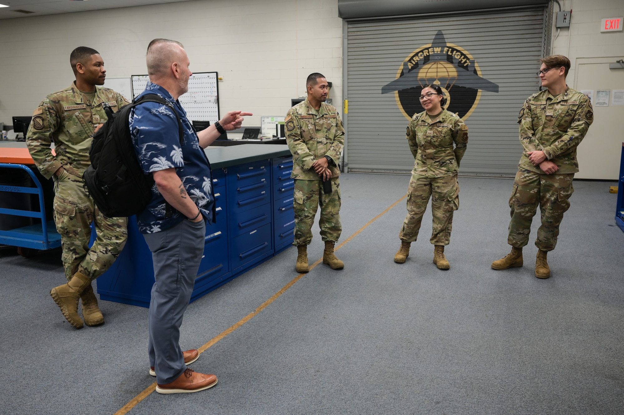 Retired Army Command Sgt. Maj. John Wayne Troxell, who served as senior enlisted advisor to the chairman of the joint chiefs of staff, speaks to 15th Operations Support Squadron aircrew flight equipment Airmen during a tour of 15th Wing at Joint Base Pearl Harbor-Hickam, Hawaii, June 27, 2023. Troxell and Weaver held three different briefs, giving enlisted Airmen from all tiers a chance to learn and share their own perspectives on leadership. (U.S. Air Force photo by Staff Sgt. Alan Ricker)