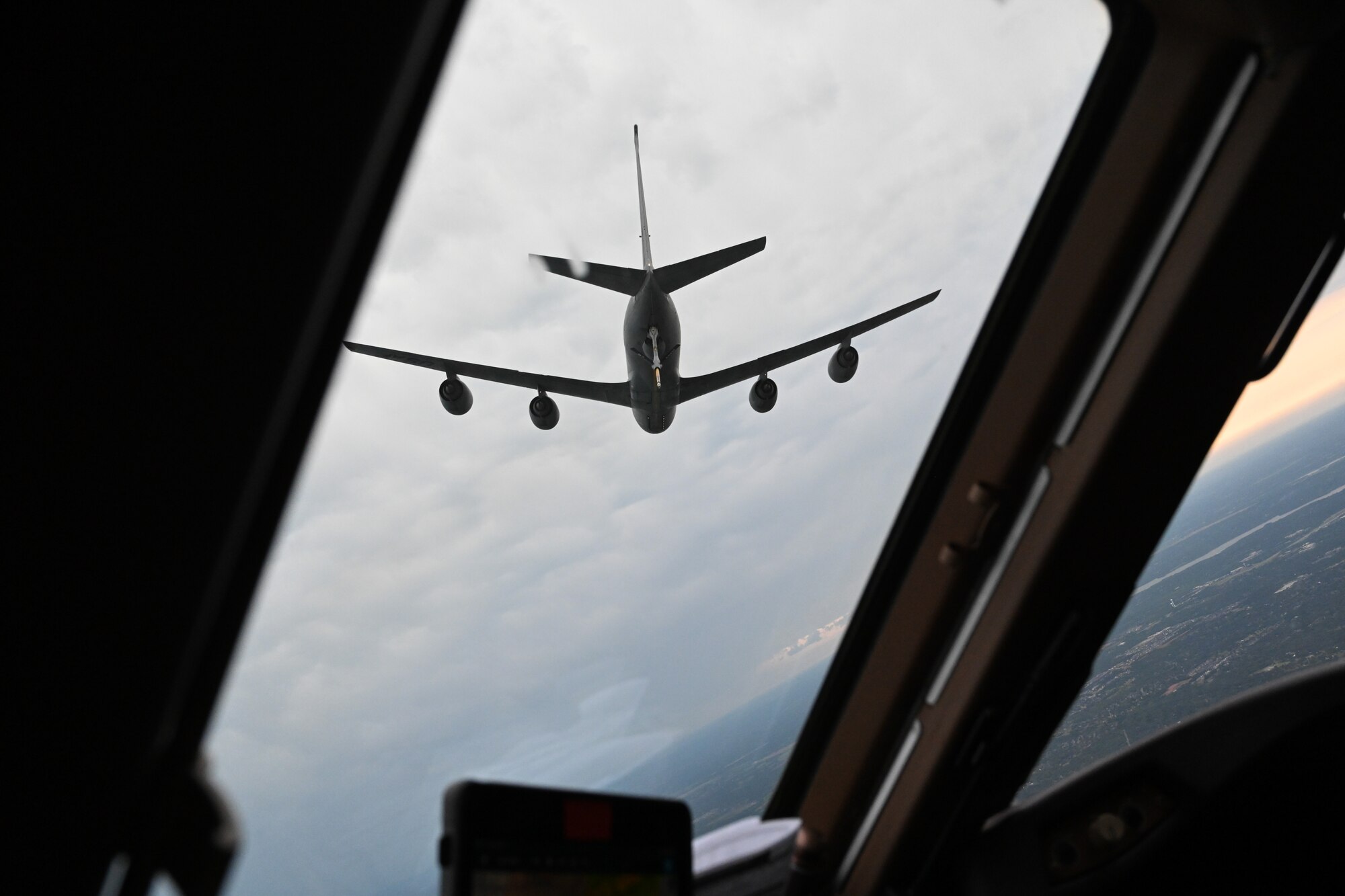 A KC-135 Stratotanker flies above a KC-46 Pegasus during the air refueling centennial flyoverin Texas and Oklahoma, June 27, 2023. Several air mobility bases from across the countryparticipated in their own flyovers to celebrate 100 years of air refuelingl. (U.S. Air Force photosby Airman 1st Class Miyah Gray)