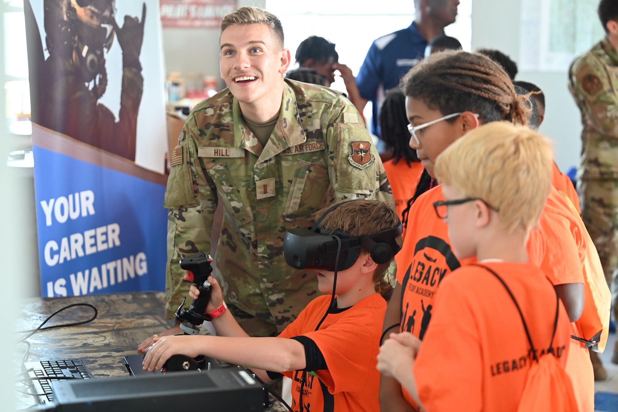 USAF pilot 2nd Lieutenant Mark Hill interacts with students during Eyes Above the Horizon activities.