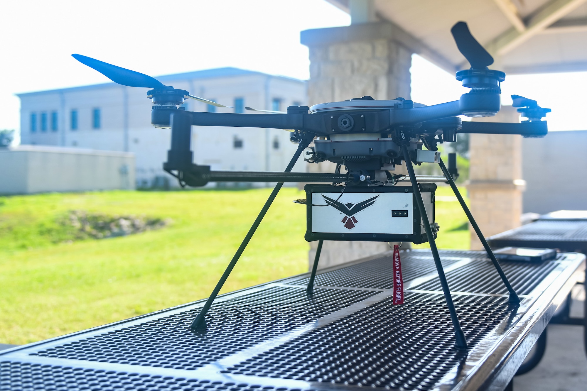 drone placed on top of a table outdoors