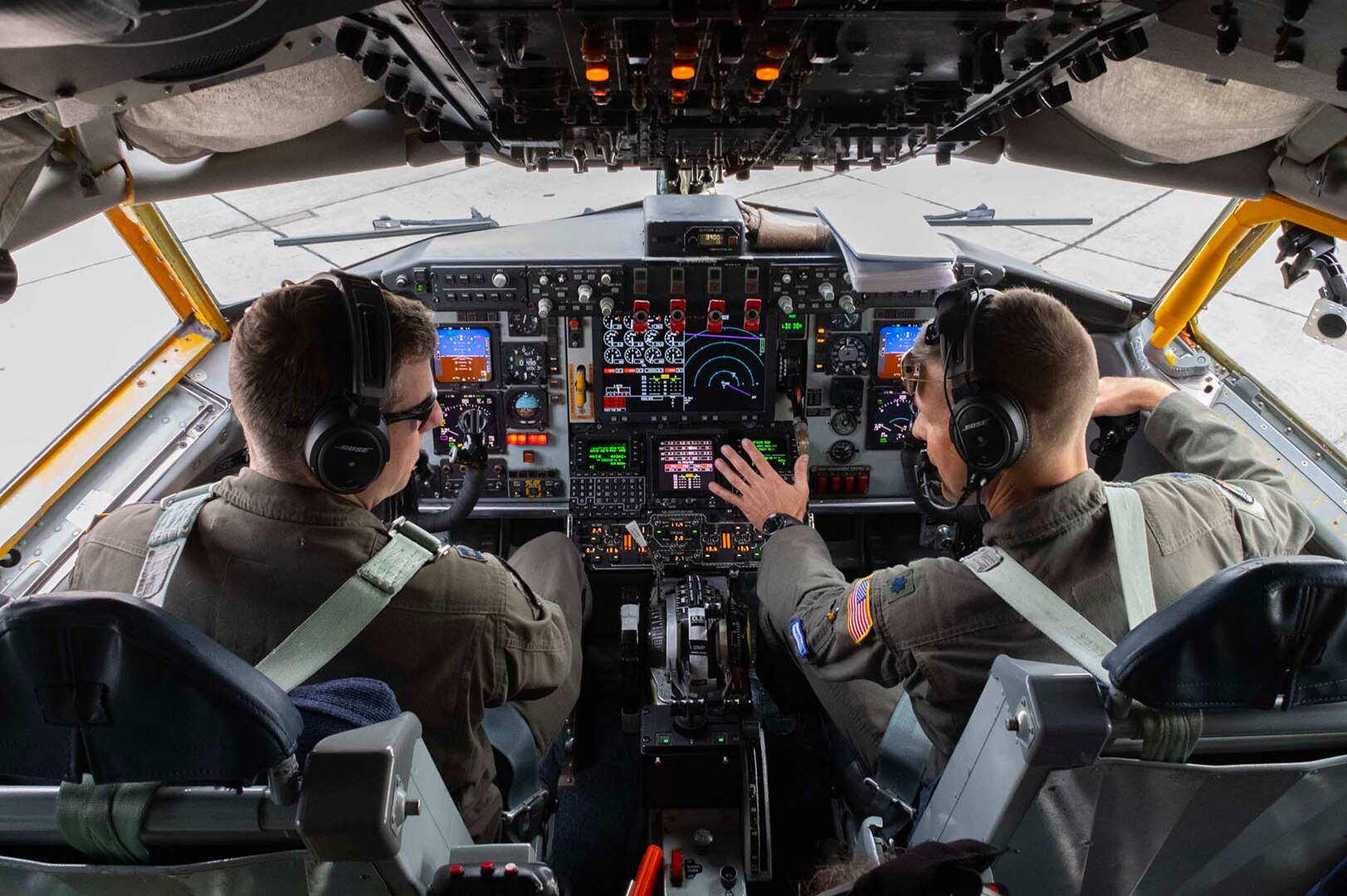 Photo of Airmen flying a jet