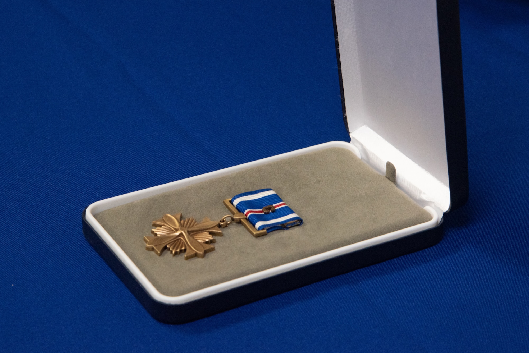 medal rest on a blue table