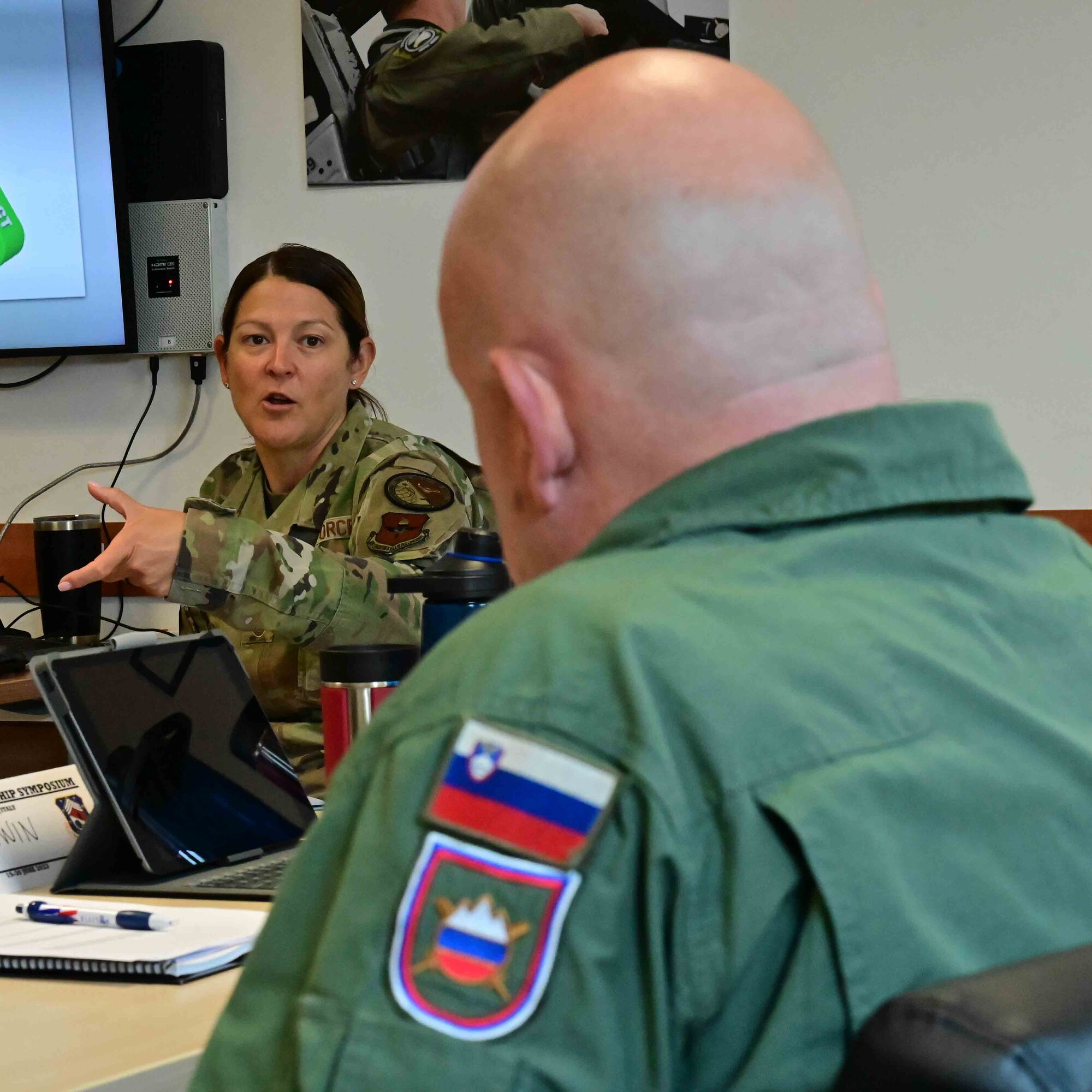 a senior leader speaks during a brief