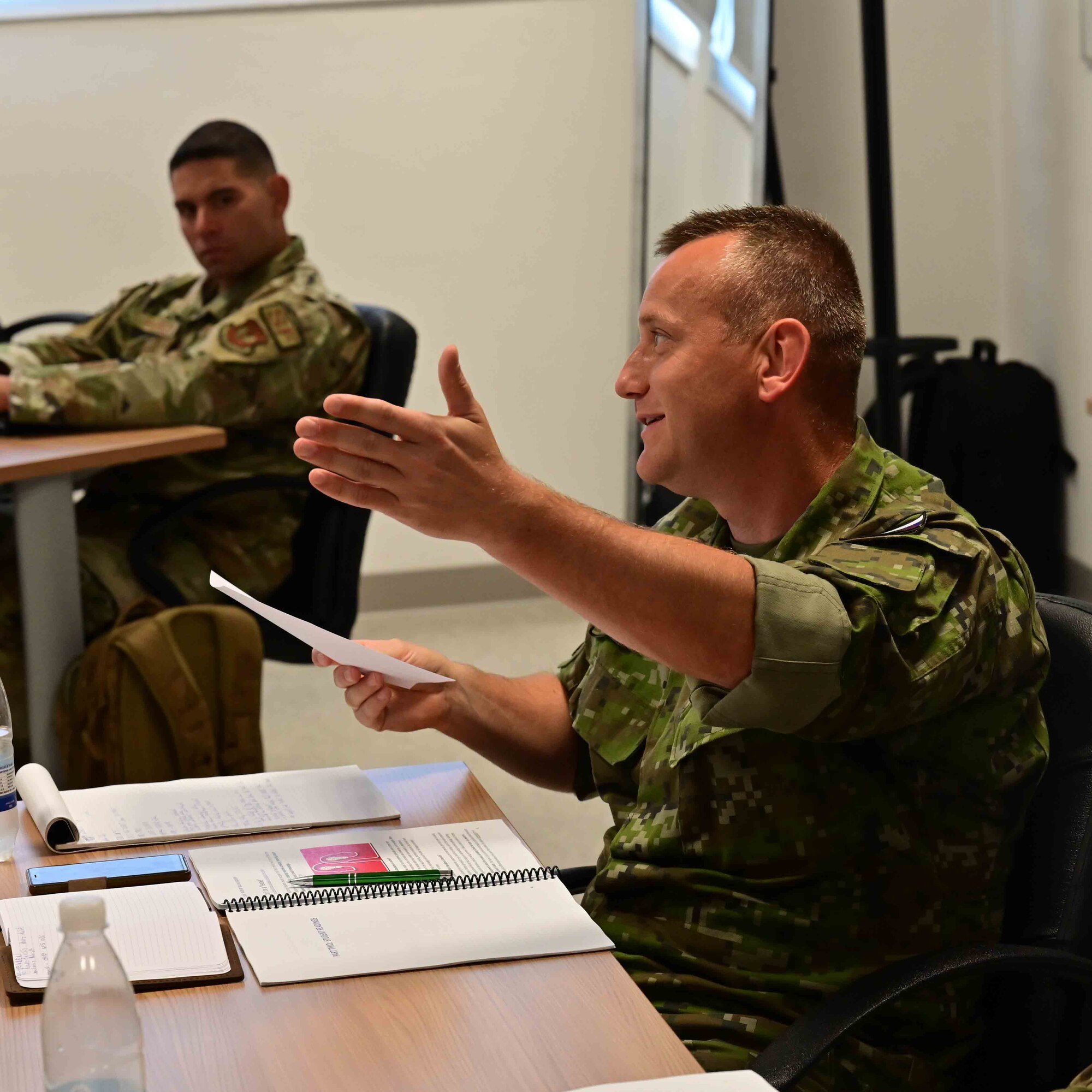 a man points during a brief